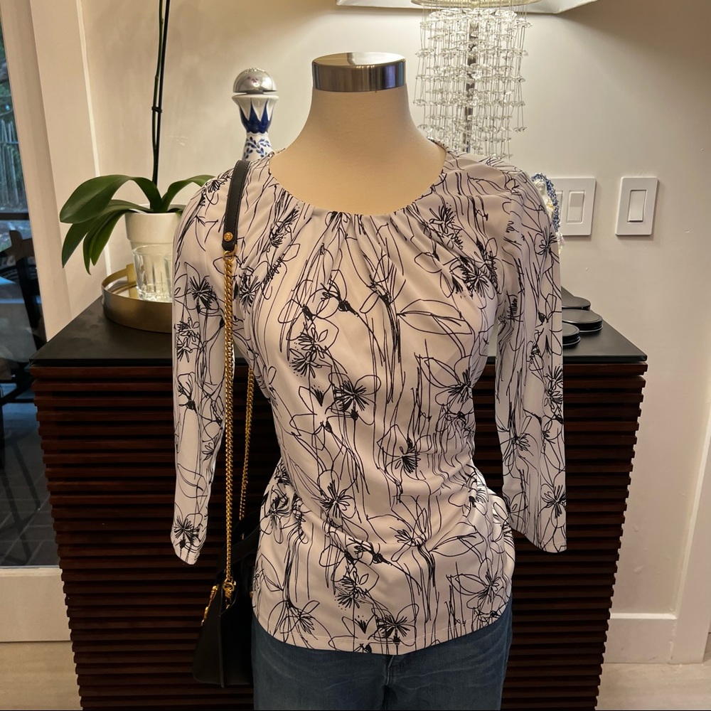 Blouse white with black flowers size M